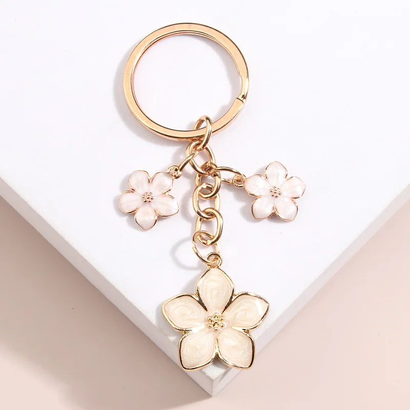 Cute Sakura Flower Keychain Plant Pendant Key Ring Enamel for Women Girls Handbag Car Keys DIY Sweet Jewelry Accessories Gifts
